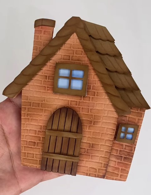 Topo de bolo pintado por aluna